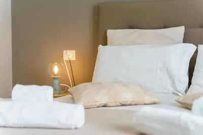 Letto o letti in una camera di La Finestra sul Duomo