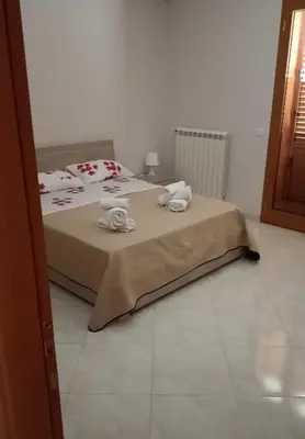 Letto o letti in una camera di Appartamento Sapienza