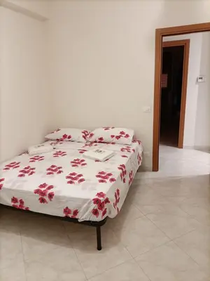 Letto o letti in una camera di Appartamento Sapienza