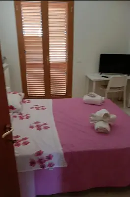 Letto o letti in una camera di Appartamento Sapienza