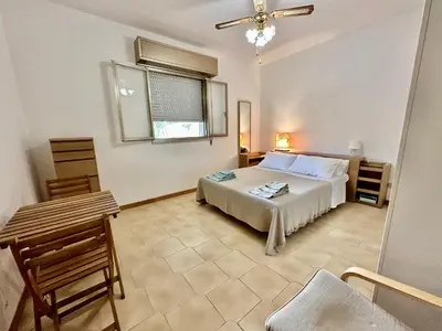 Letto o letti in una camera di Casa Holiday Sicilia 01 - 120 mt dal mare