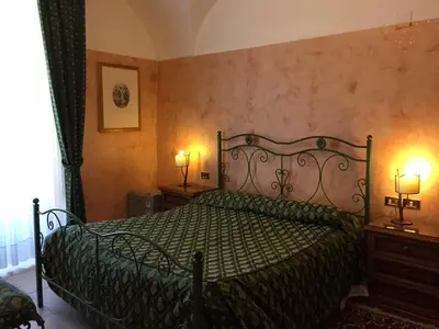 Letto o letti in una camera di Hotel Centrale Europa