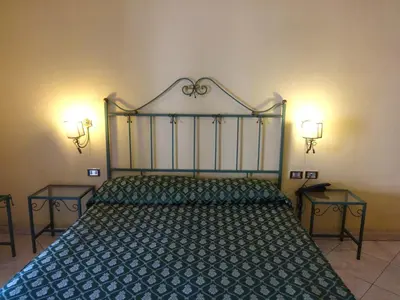 Letto o letti in una camera di Hotel Centrale Europa
