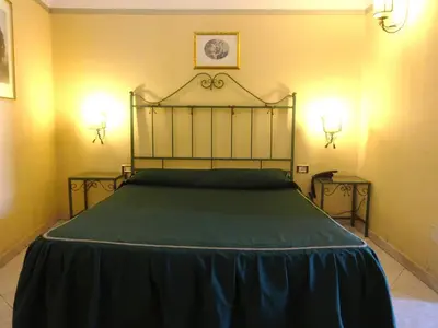 Letto o letti in una camera di Hotel Centrale Europa