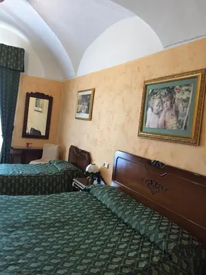 Letto o letti in una camera di Hotel Centrale Europa