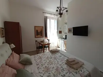 Letto o letti in una camera di La Dimora di Dionisio al Mare
