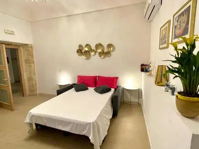 Letto o letti in una camera di Il Reginale Deluxe