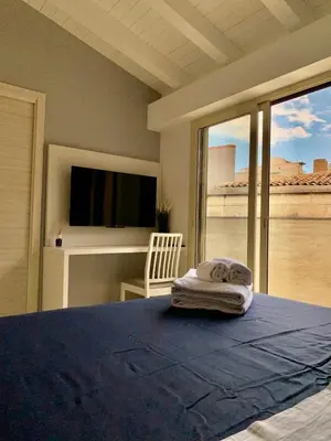 Letto o letti in una camera di Elegance