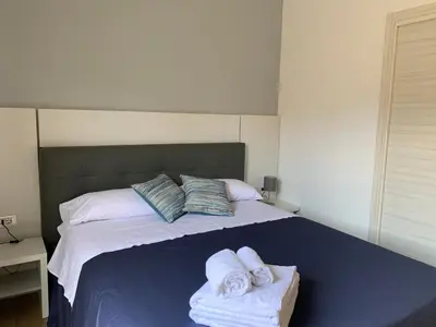 Letto o letti in una camera di Elegance
