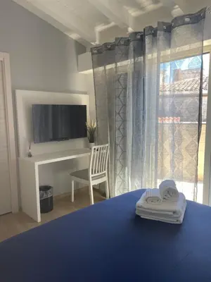 Letto o letti in una camera di Elegance