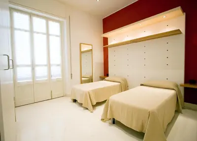 Letto o letti in una camera di Residence Arco Antico