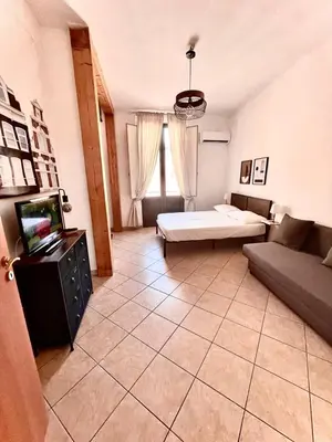 Letto o letti in una camera di Teatro Greco Suite