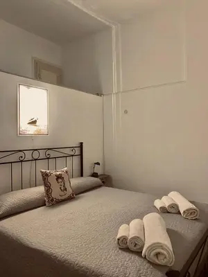 Letto o letti in una camera di Pamela House