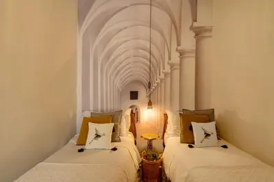 Letto o letti in una camera di IL NIDO DI ARETUSA apt by Addler House Ospitality