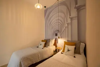 Letto o letti in una camera di IL NIDO DI ARETUSA apt by Addler House Ospitality