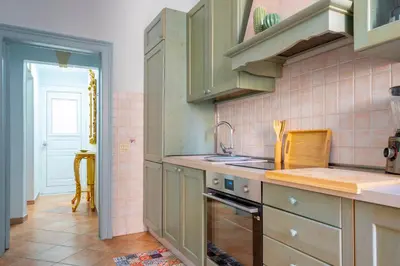 Cucina o angolo cottura di Casa dei Leoni Balcony on Piazza Duomo Ortigia