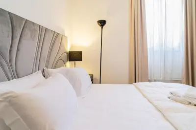 Letto o letti in una camera di Villa Del Lauro
