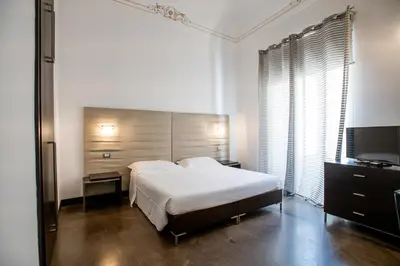 Letto o letti in una camera di Villa Del Lauro
