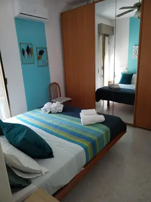Letto o letti in una camera di Casa vacanze Brezza marina fronte mare