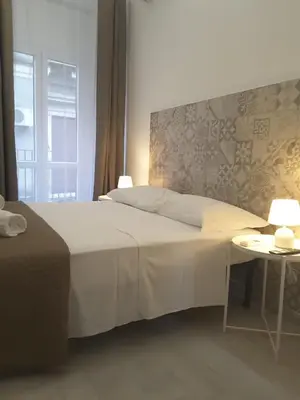 Letto o letti in una camera di A casa dei 3
