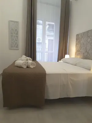 Letto o letti in una camera di A casa dei 3