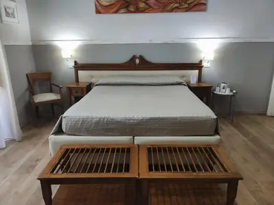 Letto o letti in una camera di La Collegiata Guest House