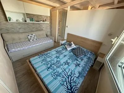 Letto o letti in una camera di La maison du bonheur