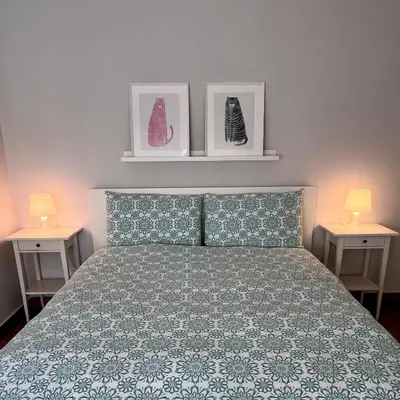 Letto o letti in una camera di Happy Home