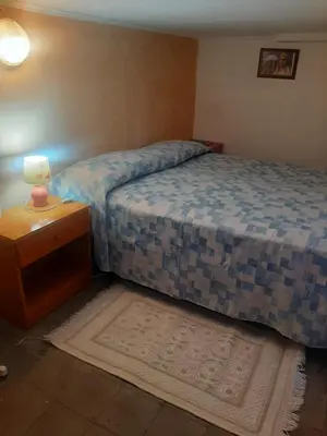 Letto o letti in una camera di La Salette