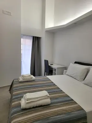Letto o letti in una camera di Casa vacanze Al Porto