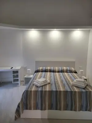 Letto o letti in una camera di Casa vacanze Al Porto
