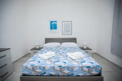 Letto o letti in una camera di Casa TORI