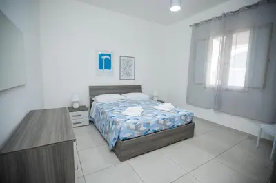Letto o letti in una camera di Casa TORI