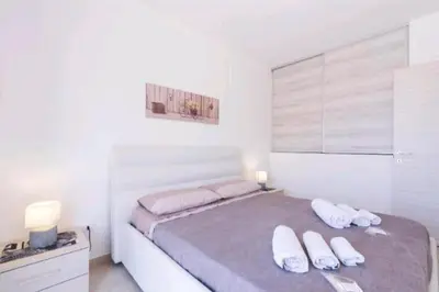 Letto o letti in una camera di Casa vacanza Marietta