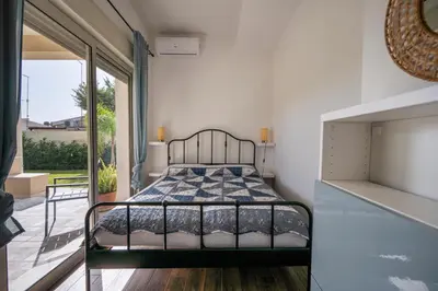 Letto o letti in una camera di Villa Nisa apartment