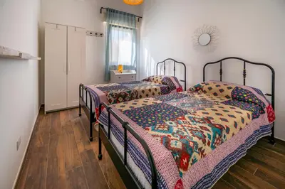 Letto o letti in una camera di Villa Nisa apartment