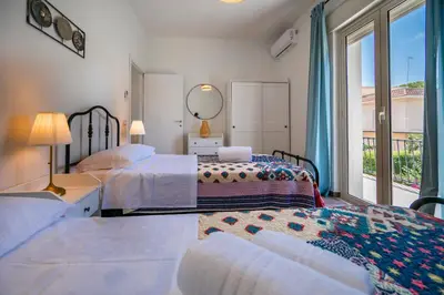 Letto o letti in una camera di Villa Nisa Apartment Sea View