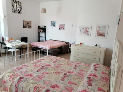 Letto o letti in una camera di Casa Smile