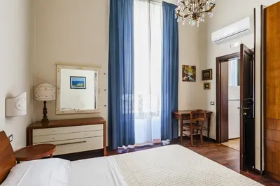 Letto o letti in una camera di Grimaldi 8 Apartment by Wonderful Italy