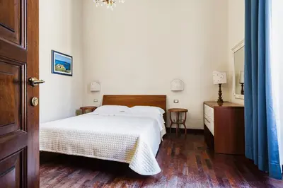 Letto o letti in una camera di Grimaldi 8 Apartment by Wonderful Italy