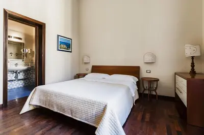 Letto o letti in una camera di Grimaldi 8 Apartment by Wonderful Italy