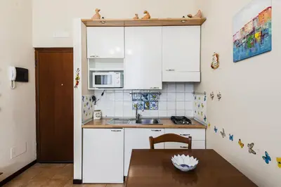 Cucina o angolo cottura di Grimaldi 8 Apartment by Wonderful Italy