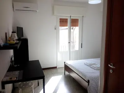 Letto o letti in una camera di L'Altra Modica Locazione Turistica
