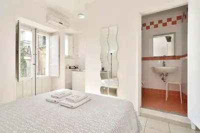 Letto o letti in una camera di L'Altra Modica Locazione Turistica