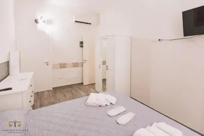 Letto o letti in una camera di Residenza Dione 1