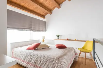 Letto o letti in una camera di Loft Mercado a Ortigia by Wonderful Italy