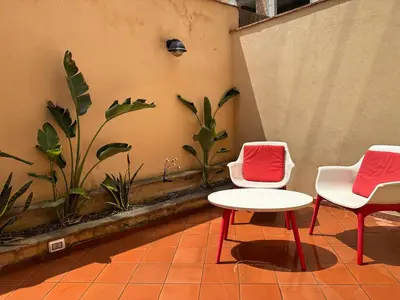 Area soggiorno di Song Apartment Catania Centro