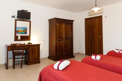 Letto o letti in una camera di Kikki Village