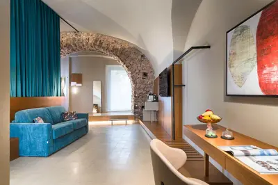 Area soggiorno di BASTIÒ PRIVATE SUITES