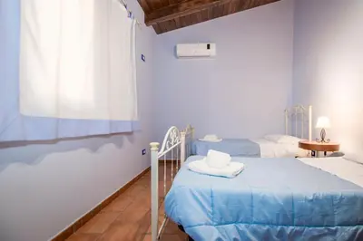 Letto o letti in una camera di Villa Sajonara Elvira